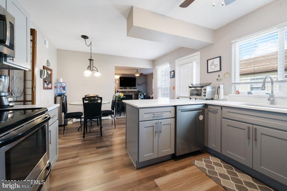 73 Red Hill Road Manchester Township, NJ 08759 - Photo 10 of 25 a kitchen with sink cabinets and appliances