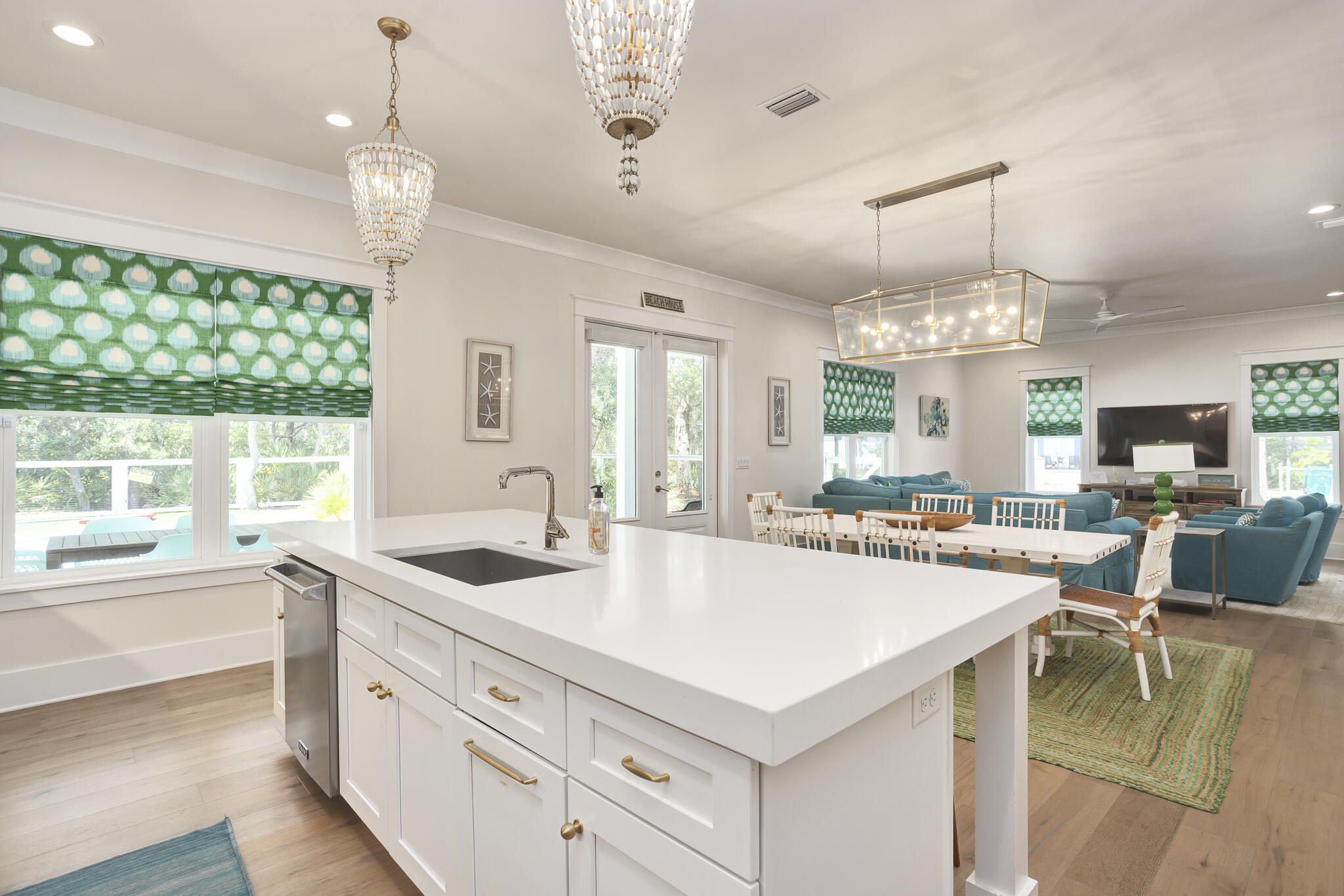 60 Blue Lake Road Santa Rosa Beach, FL 32459 - Photo 16 of 39 a large white kitchen with a large island