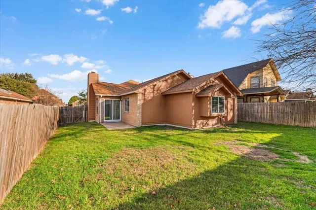 a view of a backyard with a garden