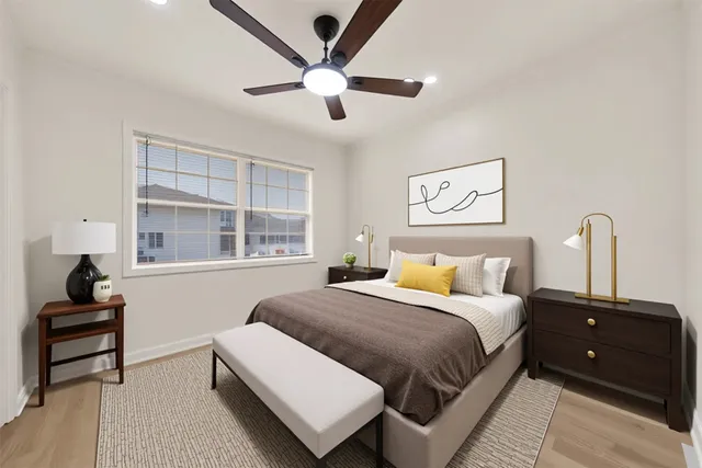 a bedroom with a bed and window