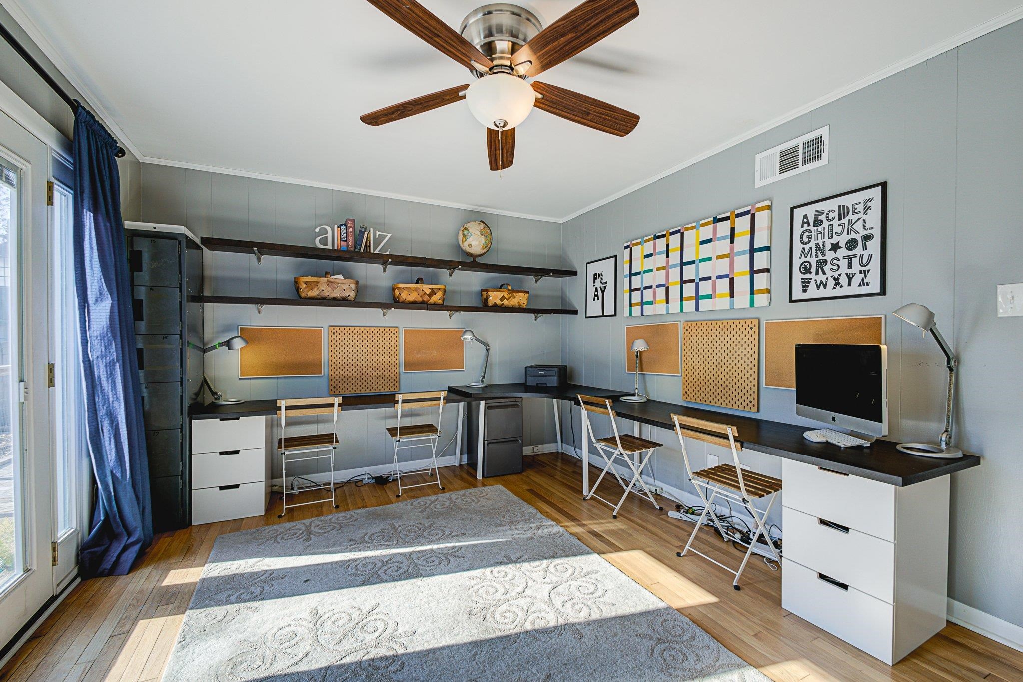 5661 Barfield Road Memphis, TN 38120 - Photo 14 of 31 Home office with ceiling fan, crown molding, and light hardwood / wood-style flooring