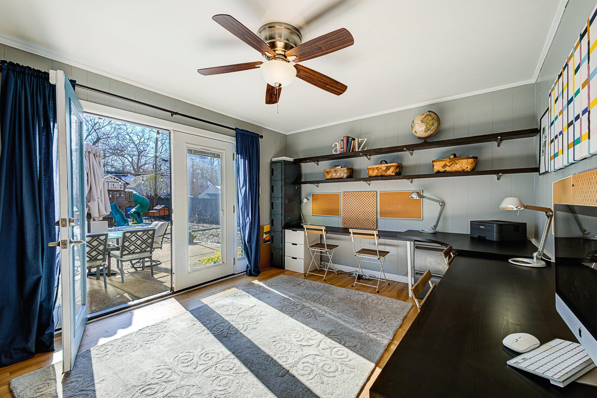5661 Barfield Road Memphis, TN 38120 - Photo 15 of 31 Home office with ornamental molding, ceiling fan, and light wood-type flooring
