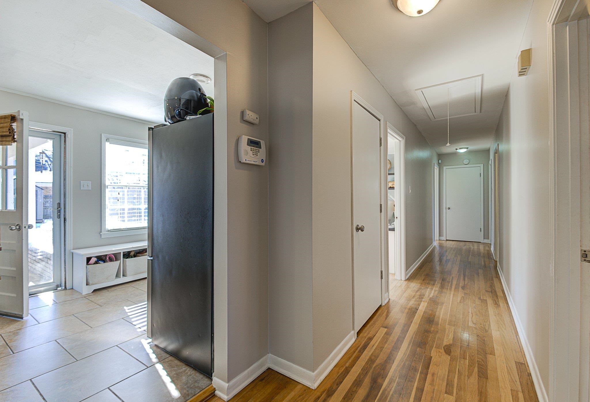 5661 Barfield Road Memphis, TN 38120 - Photo 16 of 31 Corridor with light hardwood / wood-style flooring