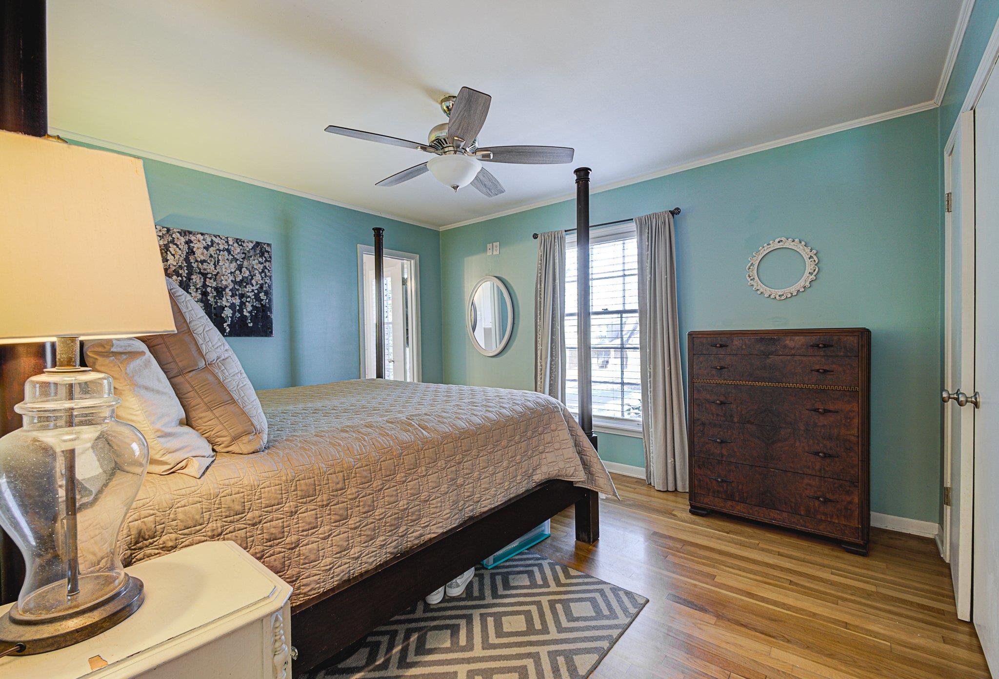 5661 Barfield Road Memphis, TN 38120 - Photo 18 of 31 Bedroom with ceiling fan, crown molding, and light hardwood / wood-style floors