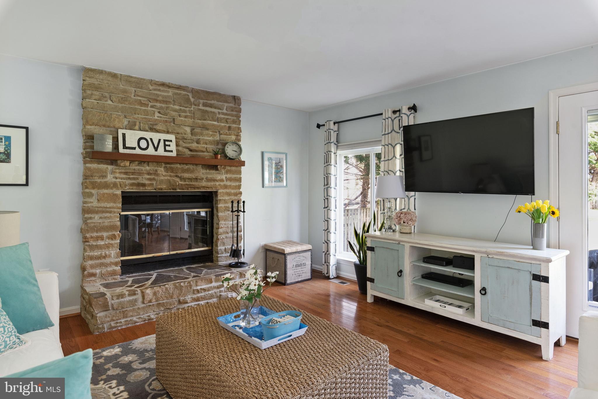 416 Riding Ridge Road Annapolis, MD 21403 - Photo 5 of 46 Family room with wood burning fireplace