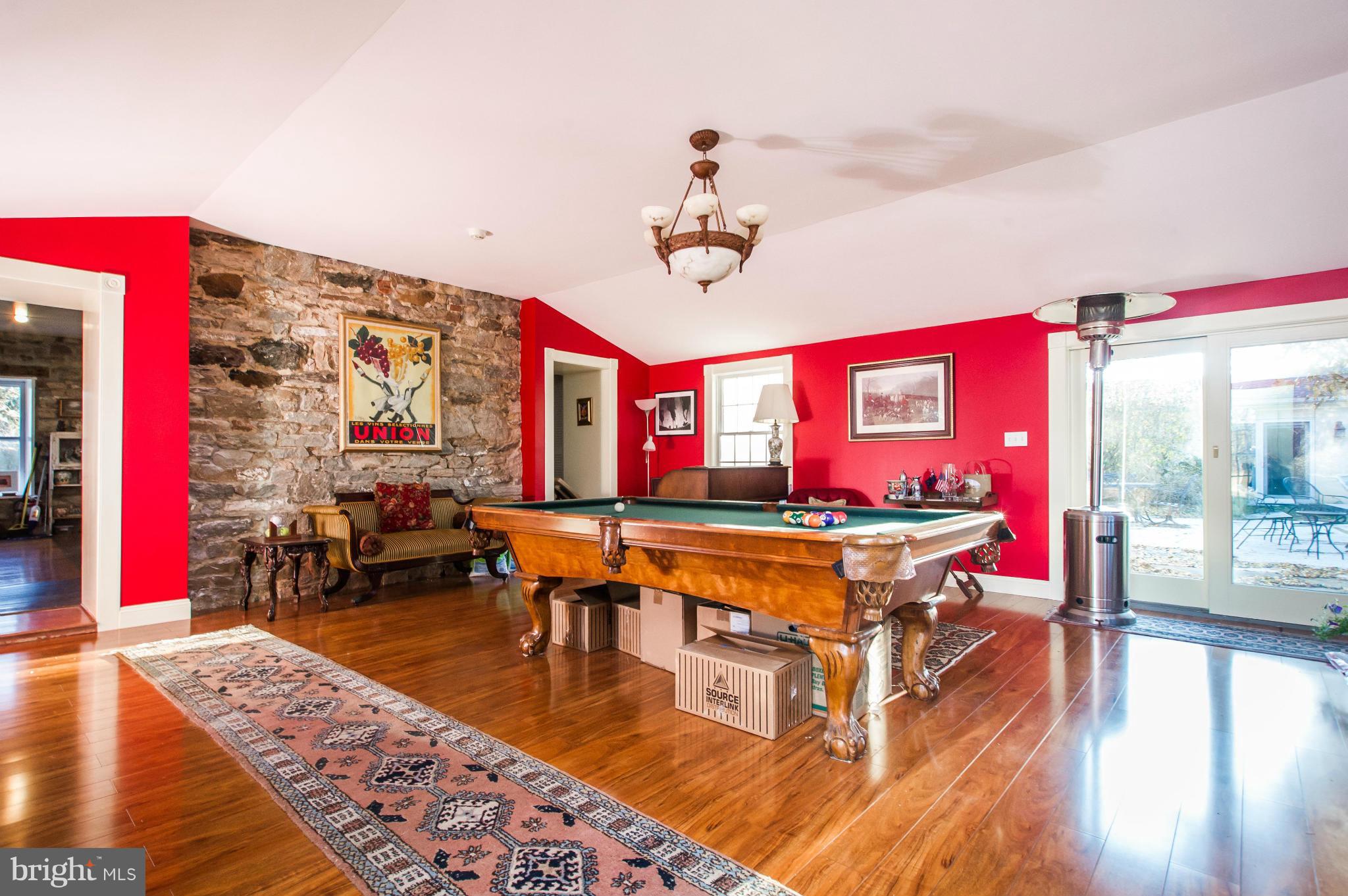 16300 Cedar Grove Road Sparks Glencoe, MD 21152 - Photo 13 of 28 a living room with stainless steel appliances kitchen island granite countertop furniture and a rug