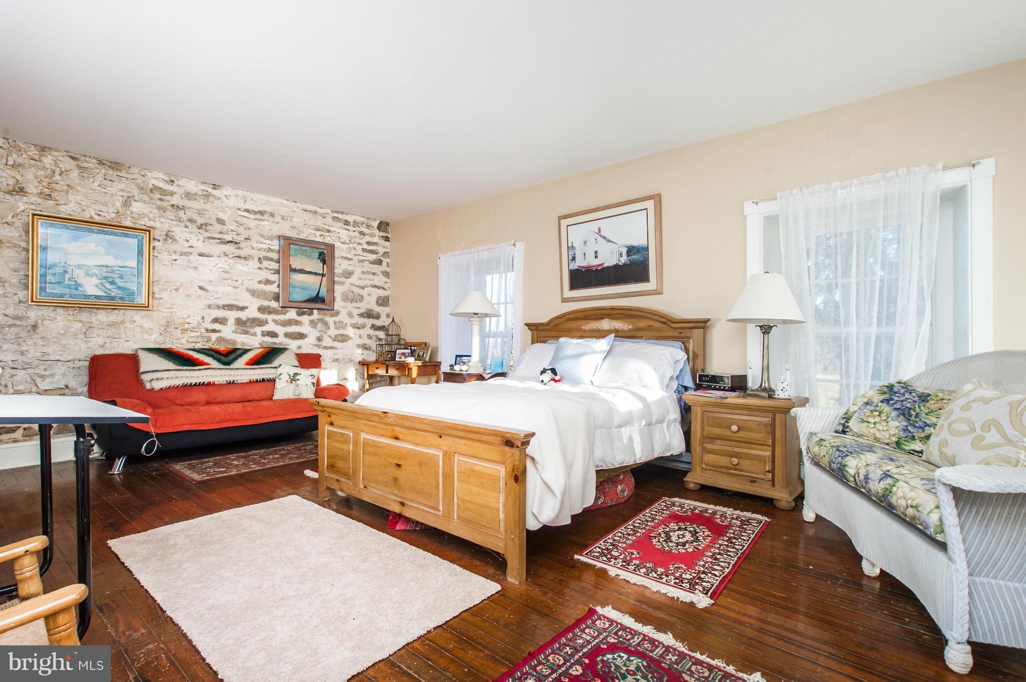 16300 Cedar Grove Road Sparks Glencoe, MD 21152 - Photo 16 of 28 a bedroom with bed and a night stand