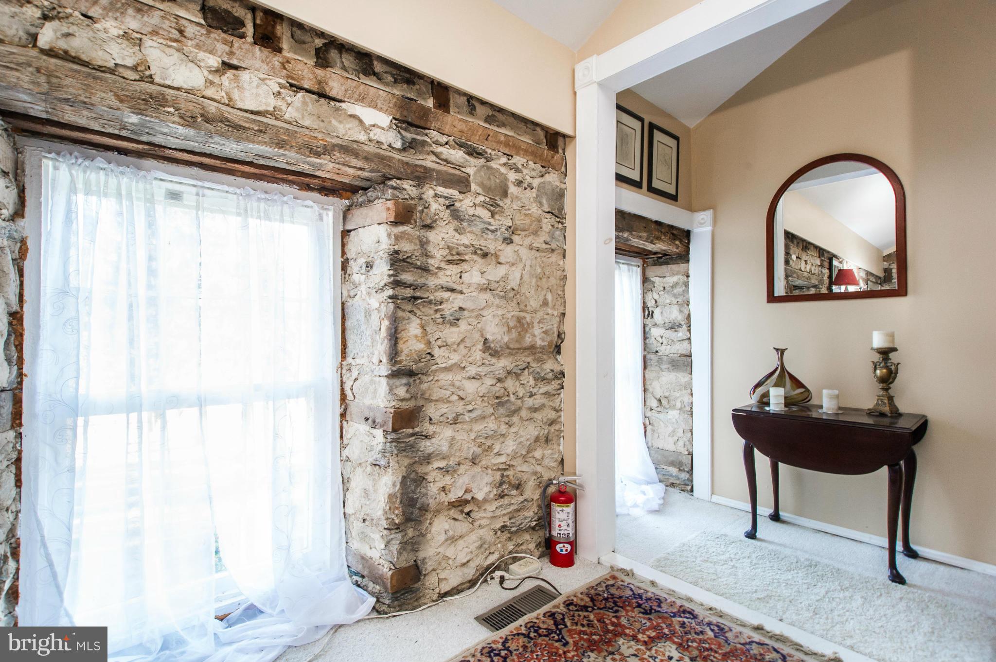 16300 Cedar Grove Road Sparks Glencoe, MD 21152 - Photo 17 of 28 a living room with a couch and a table