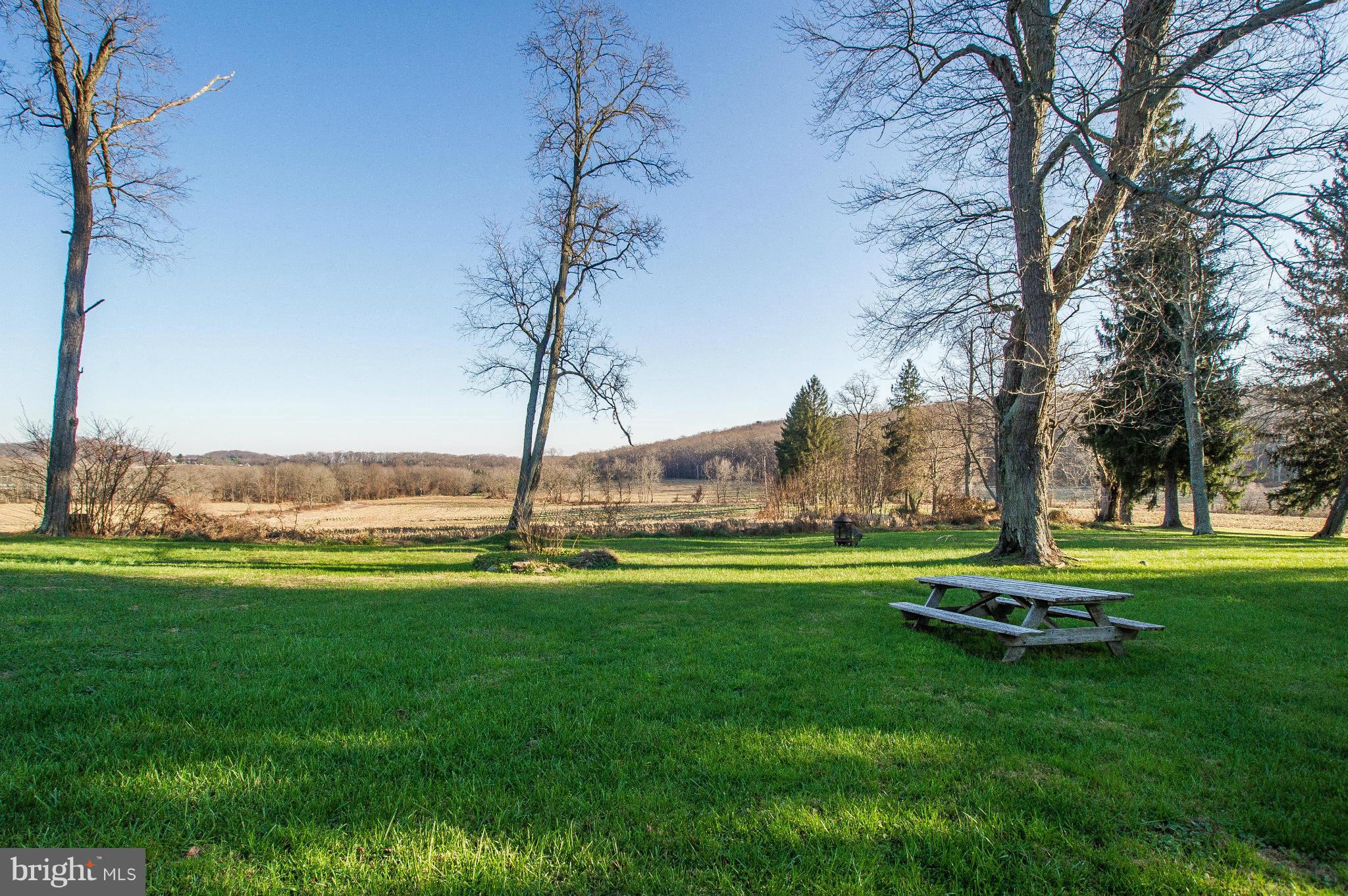 16300 Cedar Grove Road Sparks Glencoe, MD 21152 - Photo 4 of 28 a park with a bench and trees