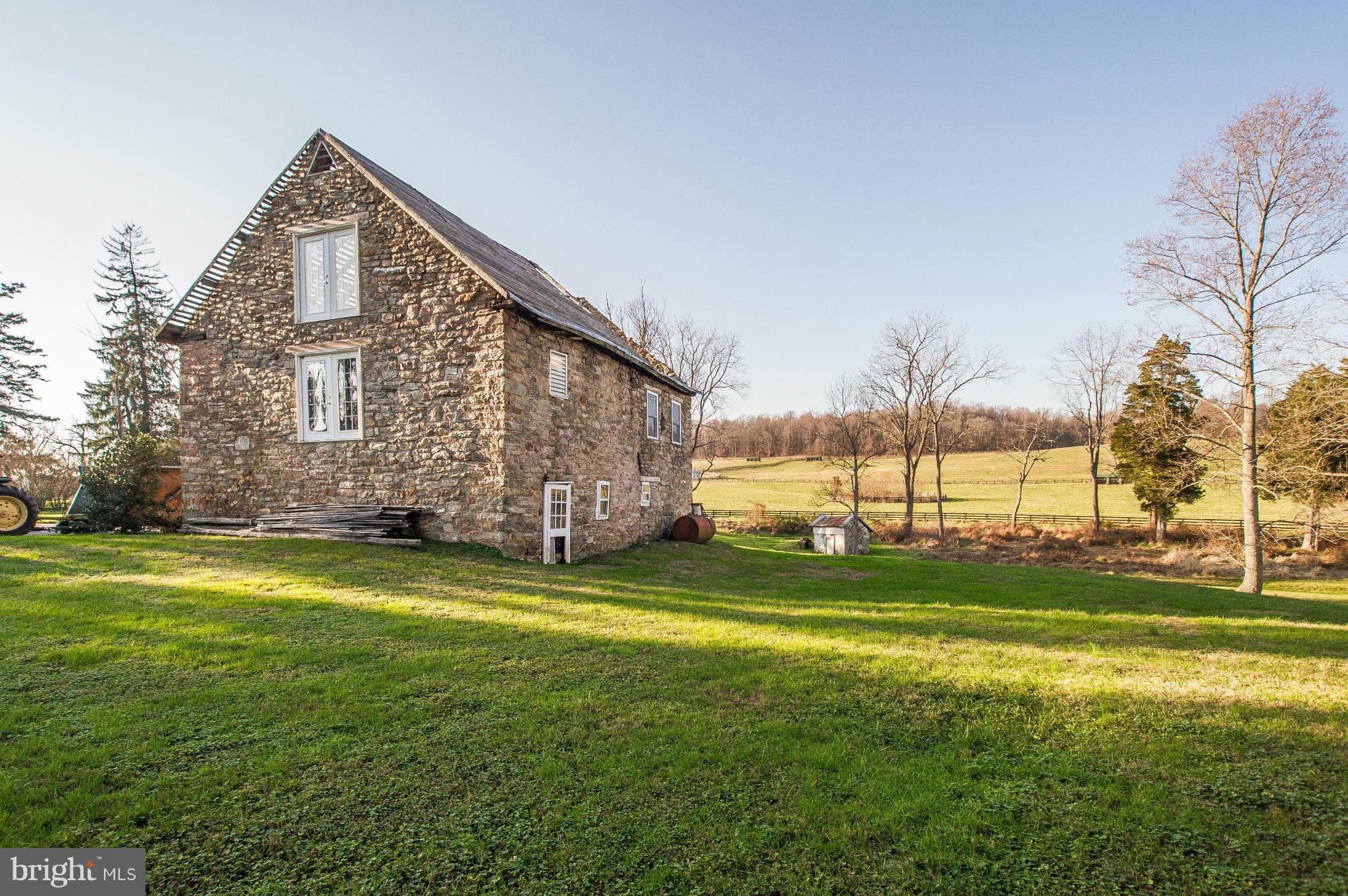 16300 Cedar Grove Road Sparks Glencoe, MD 21152 - Photo 7 of 28 a view of a house with a big yard and a large trees