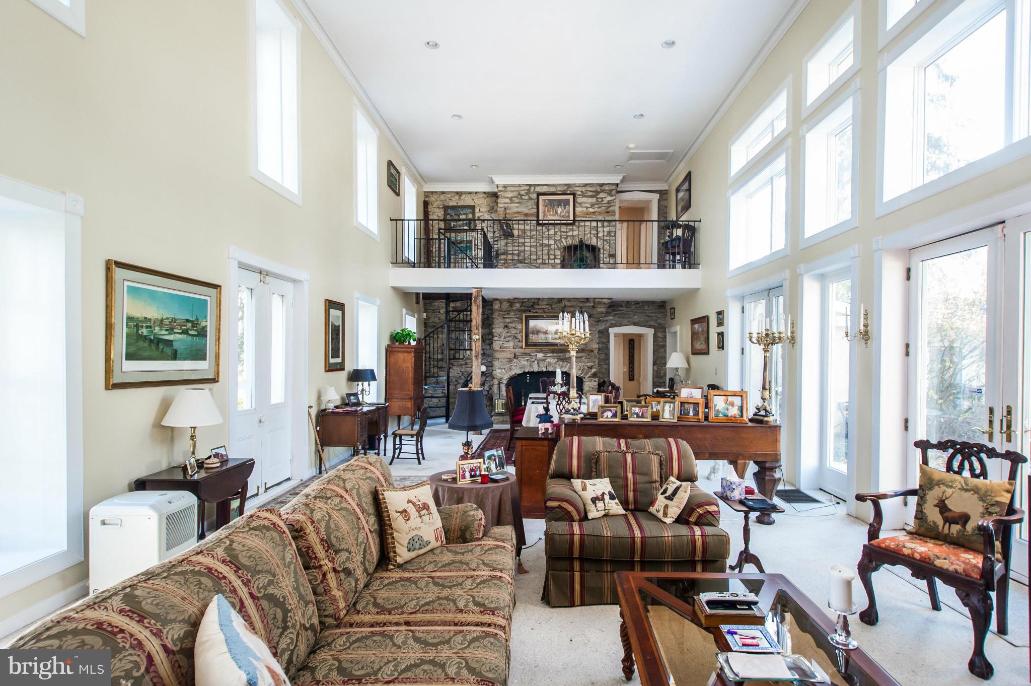 16300 Cedar Grove Road Sparks Glencoe, MD 21152 - Photo 9 of 28 a living room with furniture a fireplace and a large window