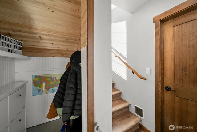 a view of entryway with wooden floor