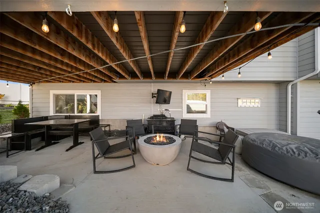 a living room with furniture and a window