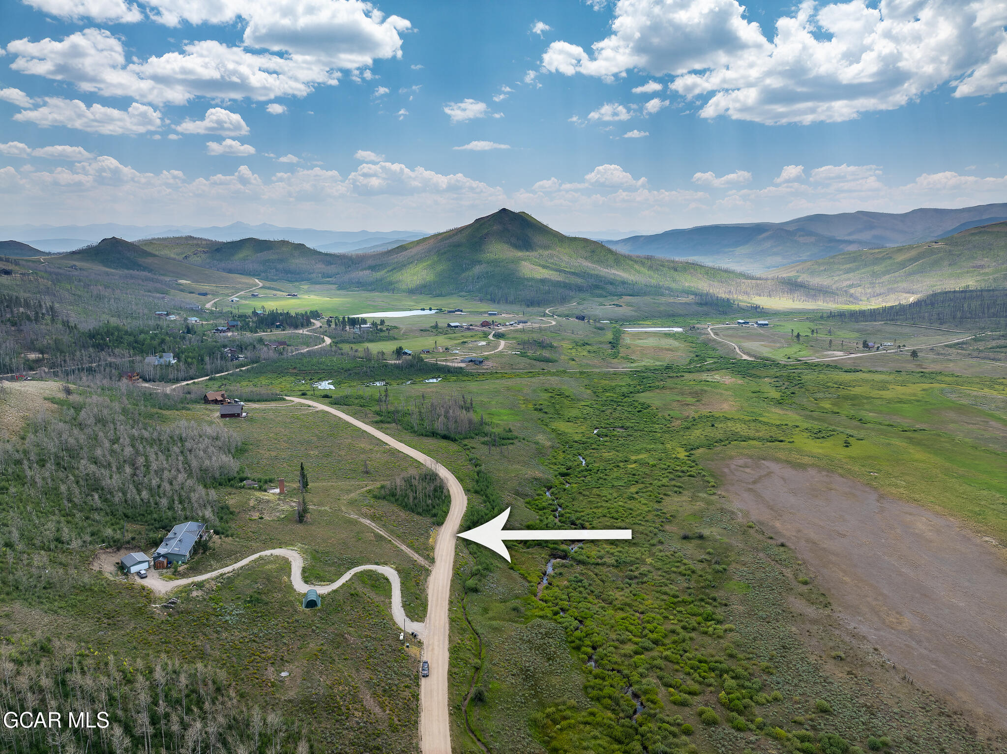 5294 Gcr 41 Granby, CO 80446 - Photo 3 of 7 a view of a lake with a mountain