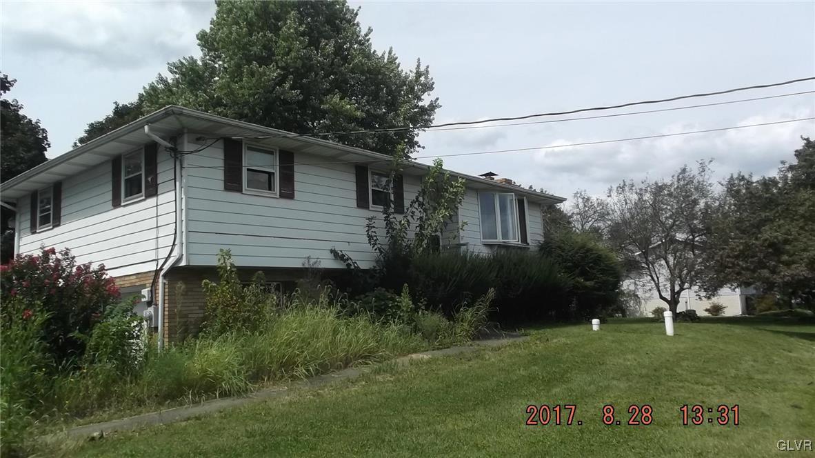 801 Bangor Road Nazareth, PA 18064 - Photo 1 of 10 a backyard of a house with plants and large trees