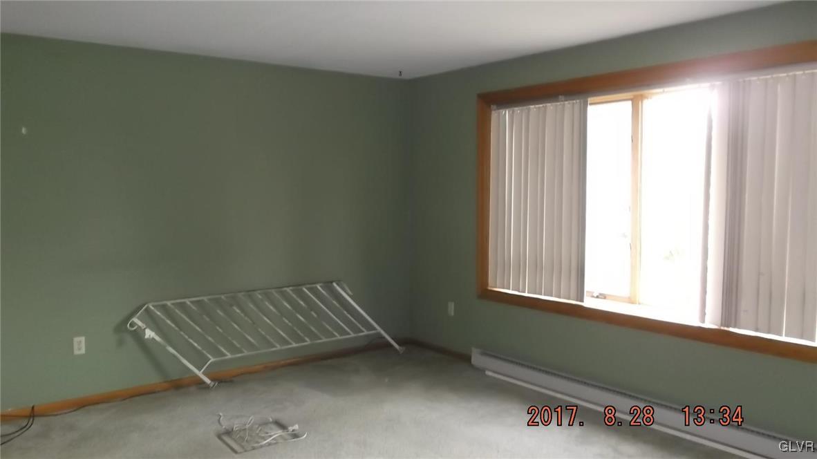 801 Bangor Road Nazareth, PA 18064 - Photo 2 of 10 an empty room with windows