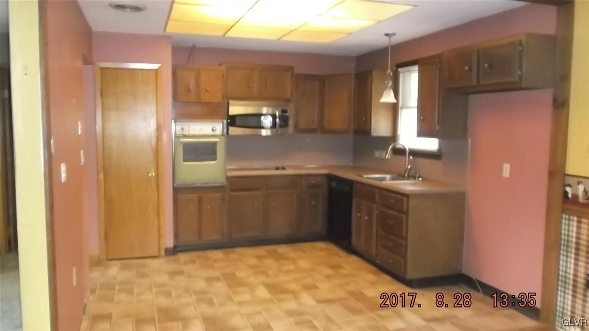 801 Bangor Road Nazareth, PA 18064 - Photo 3 of 10 a kitchen with a sink cabinets and window