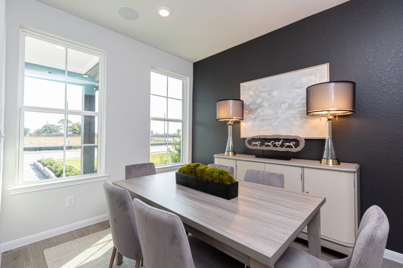 2039 Frst Strm Way Conroe, TX 77304 - Photo 2 of 8 a kitchen with a table and chairs