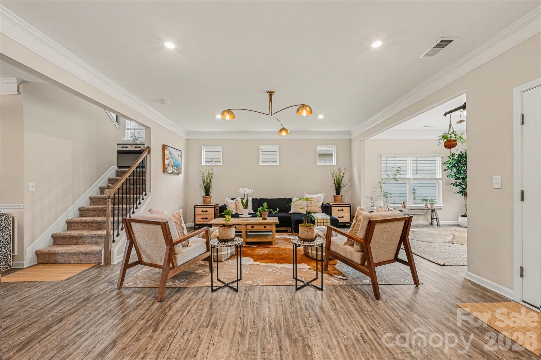 425 Kiser Lane Locust, NC 28097 - Photo 12 of 25 a view of a livingroom with furniture and wooden floor