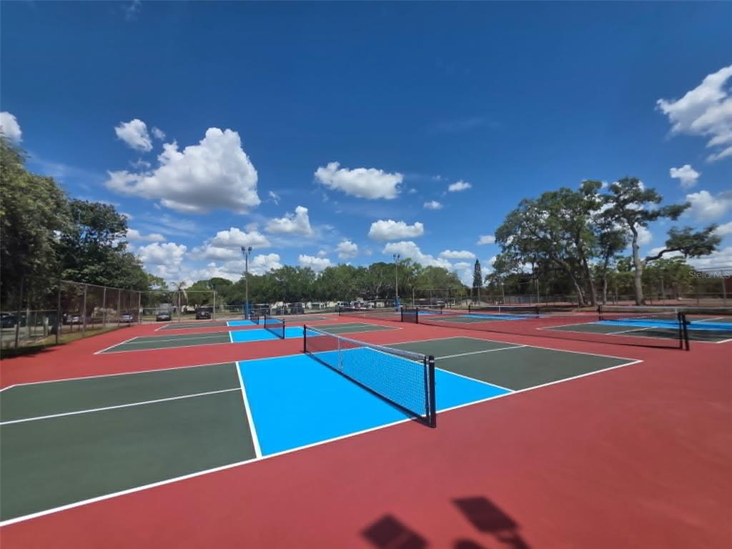 4392 Craftsbury Drive New Port Richey, FL 34652 - Photo 35 of 41 a view of a tennis court