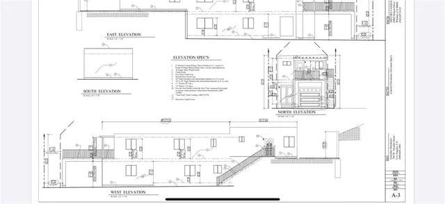 a black and white photo of a white wall with a white wall