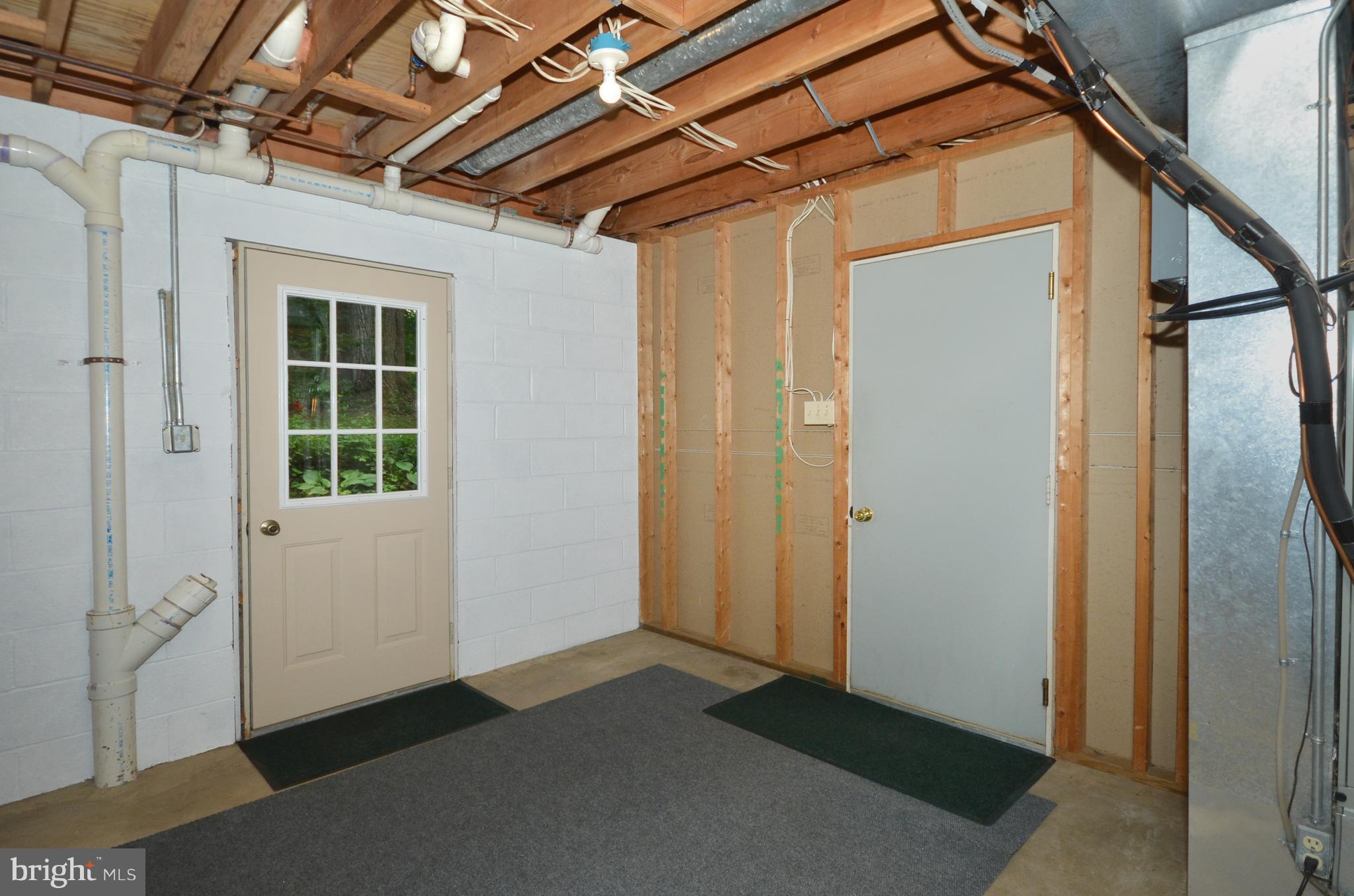 903 Monkton Road Monkton, MD 21111 - Photo 21 of 29 Lower level walk out level & door to garage