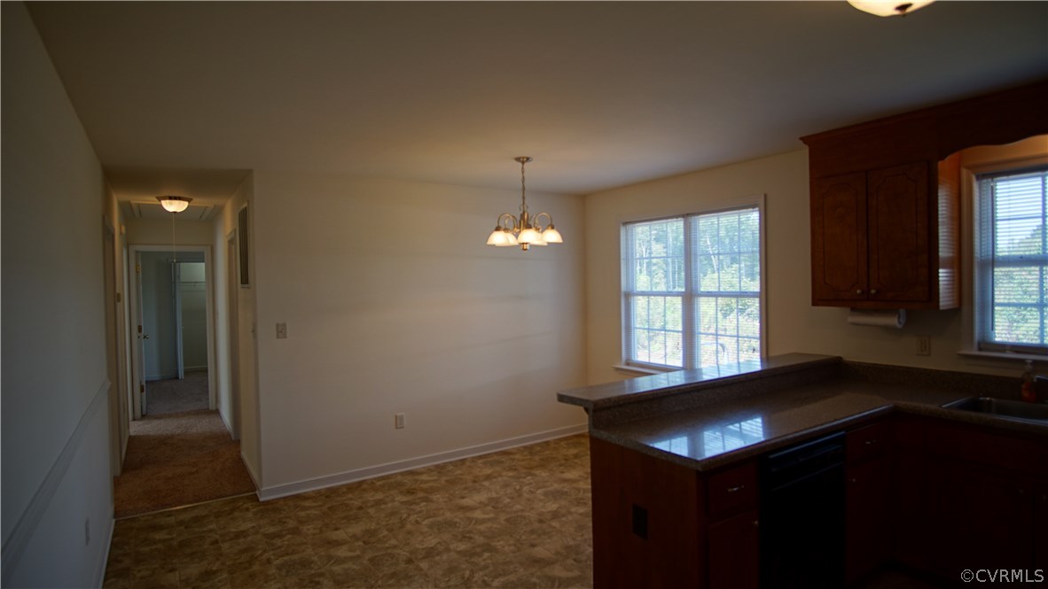 10734 Scotts Road Dewitt, VA 23840 - Photo 18 of 34 an empty room with windows