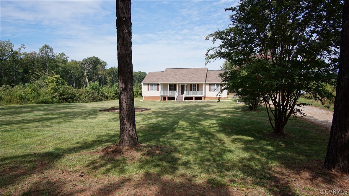 10734 Scotts Road Dewitt, VA 23840 - Photo 2 of 34 a view of a house with a yard