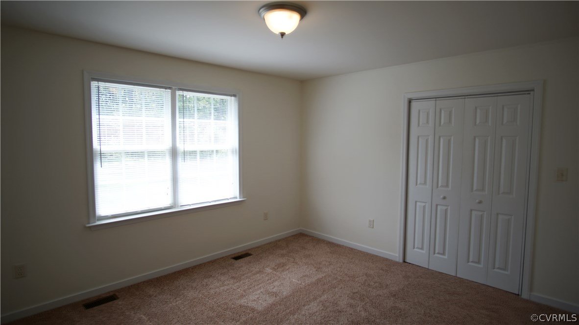 10734 Scotts Road Dewitt, VA 23840 - Photo 31 of 34 an empty room with a window