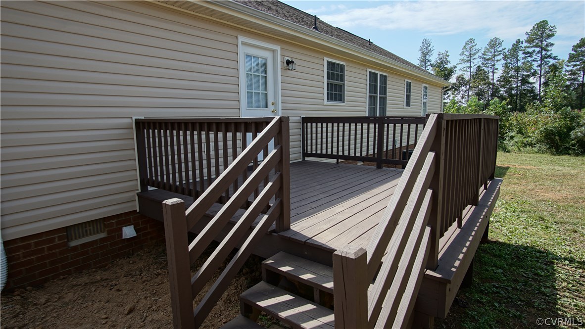 10734 Scotts Road Dewitt, VA 23840 - Photo 8 of 34 a view of backyard with a deck