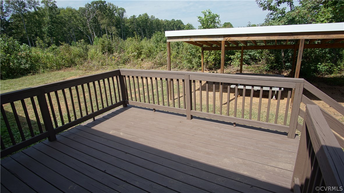 10734 Scotts Road Dewitt, VA 23840 - Photo 9 of 34 a view of outdoor space with deck and yard