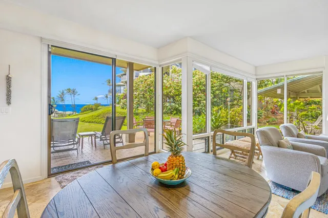 a living room with furniture and a table