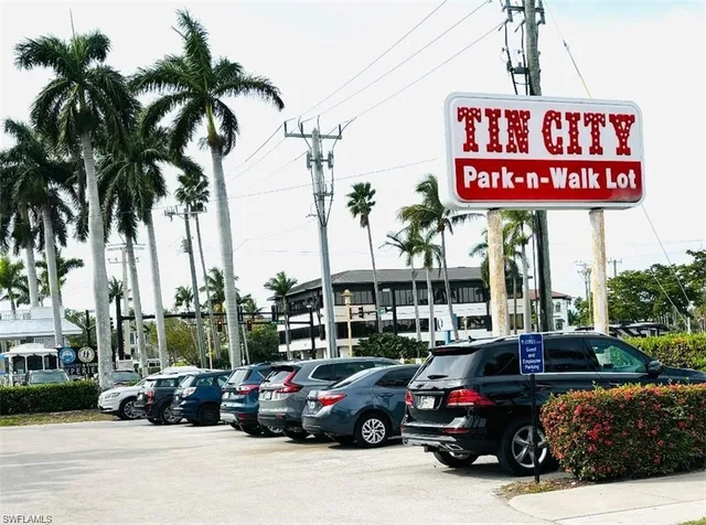 a cars parked in front of a store