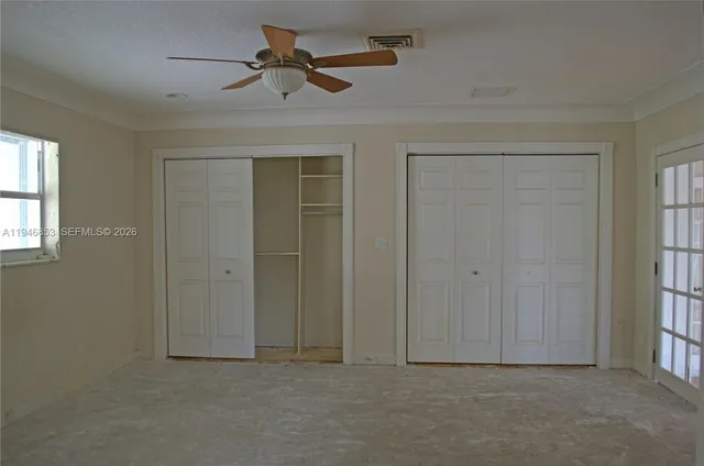 a bathroom with a shower and a sink