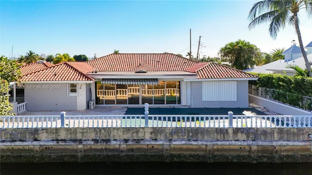 a view of a lake with a house