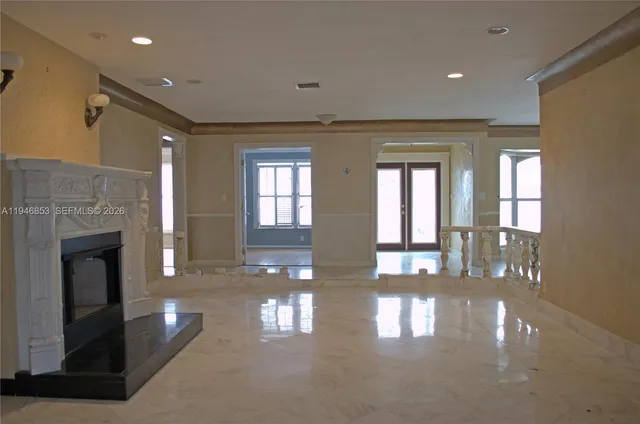 a view of a livingroom with a fireplace