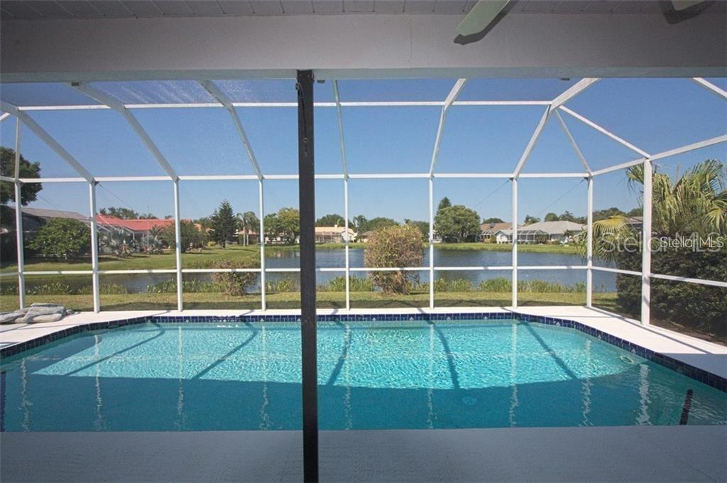 6907 Ranch Road Sarasota, FL 34243 - Photo 12 of 14 a view of a indoor swimming pool
