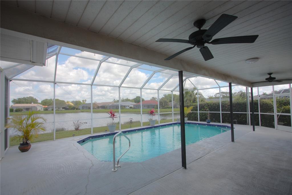6907 Ranch Road Sarasota, FL 34243 - Photo 13 of 14 a view of a room with gym equipment and windows
