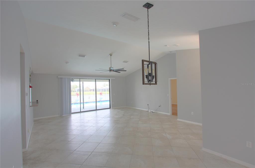 6907 Ranch Road Sarasota, FL 34243 - Photo 3 of 14 a view of an empty room with a window