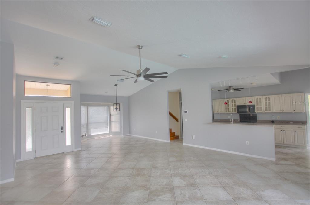 6907 Ranch Road Sarasota, FL 34243 - Photo 6 of 14 a view of a kitchen with a sink and cabinet area