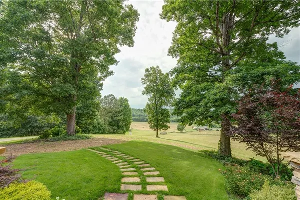 a view of backyard with green space