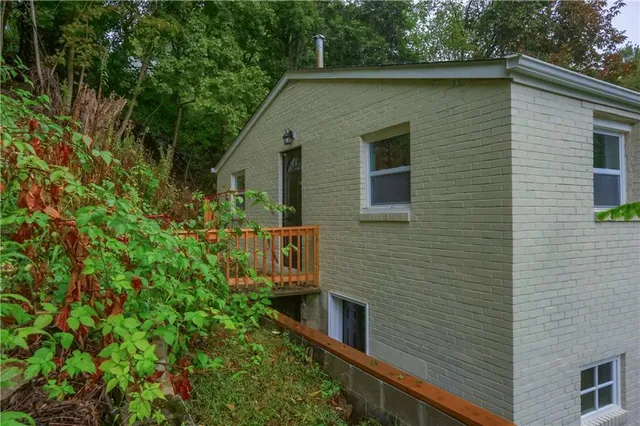 a view of house with outdoor space