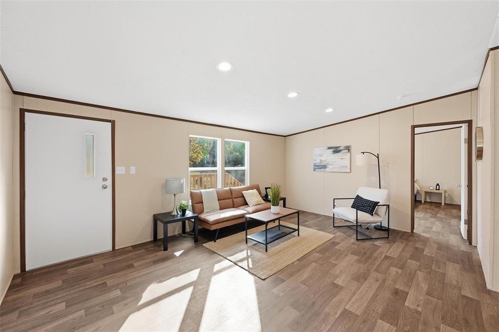 279 Carlisle Court Springtown, TX 76082 - Photo 2 of 18 a living room with furniture