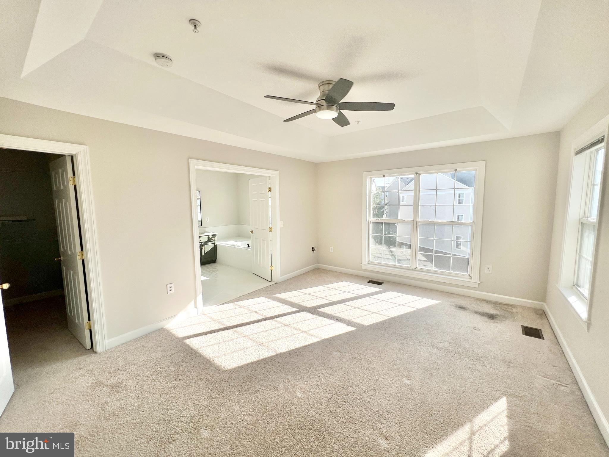 13548 Davinci Lane, Unit 46 Herndon, VA 20171 - Photo 14 of 28 a view of an empty room with a window