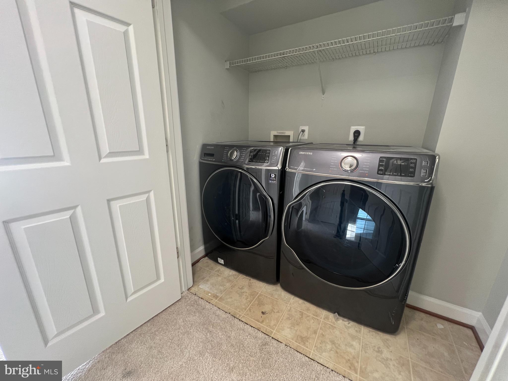 13548 Davinci Lane, Unit 46 Herndon, VA 20171 - Photo 19 of 28 a utility room with dryer and washer