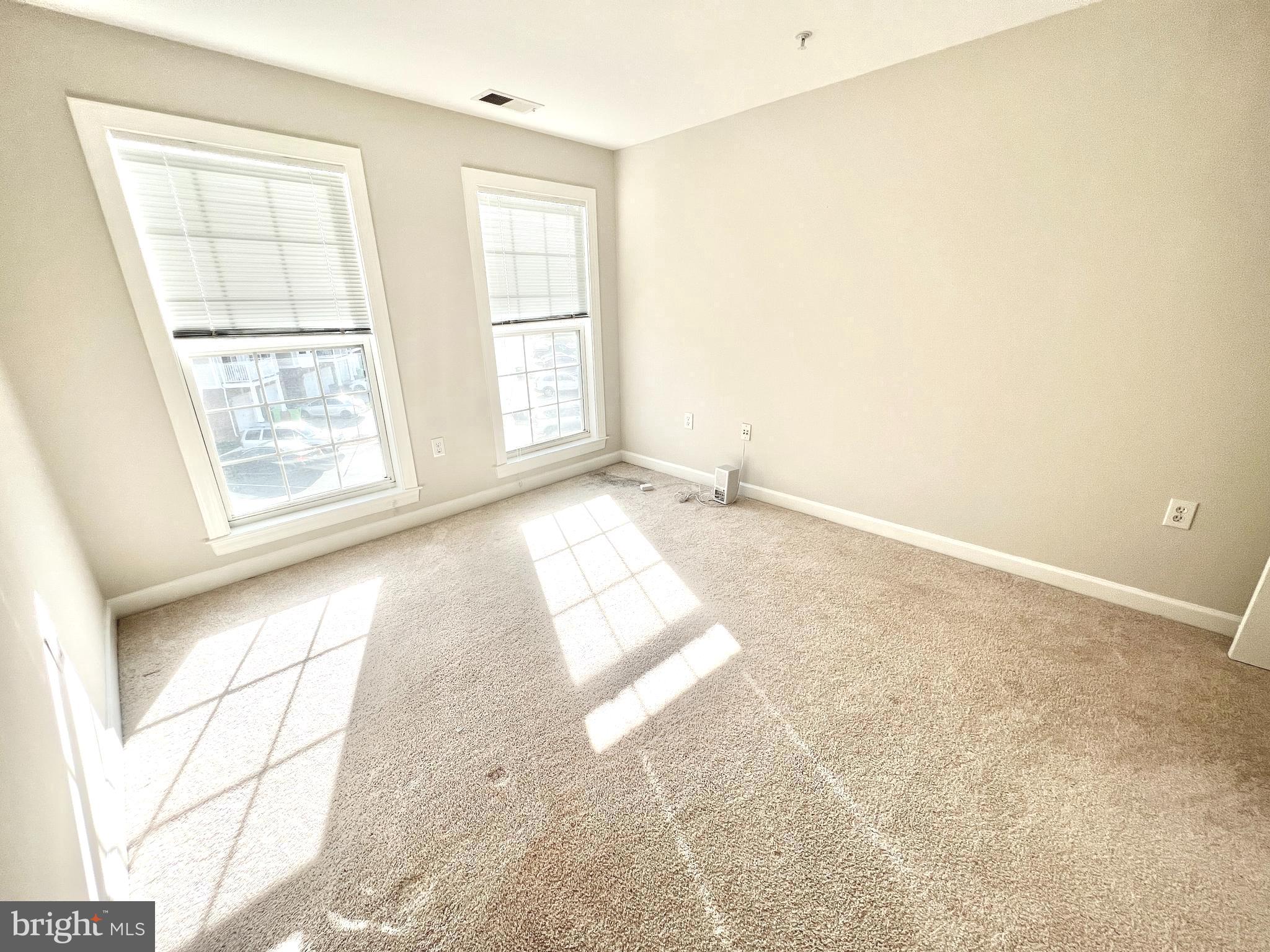 13548 Davinci Lane, Unit 46 Herndon, VA 20171 - Photo 20 of 28 an empty room with windows