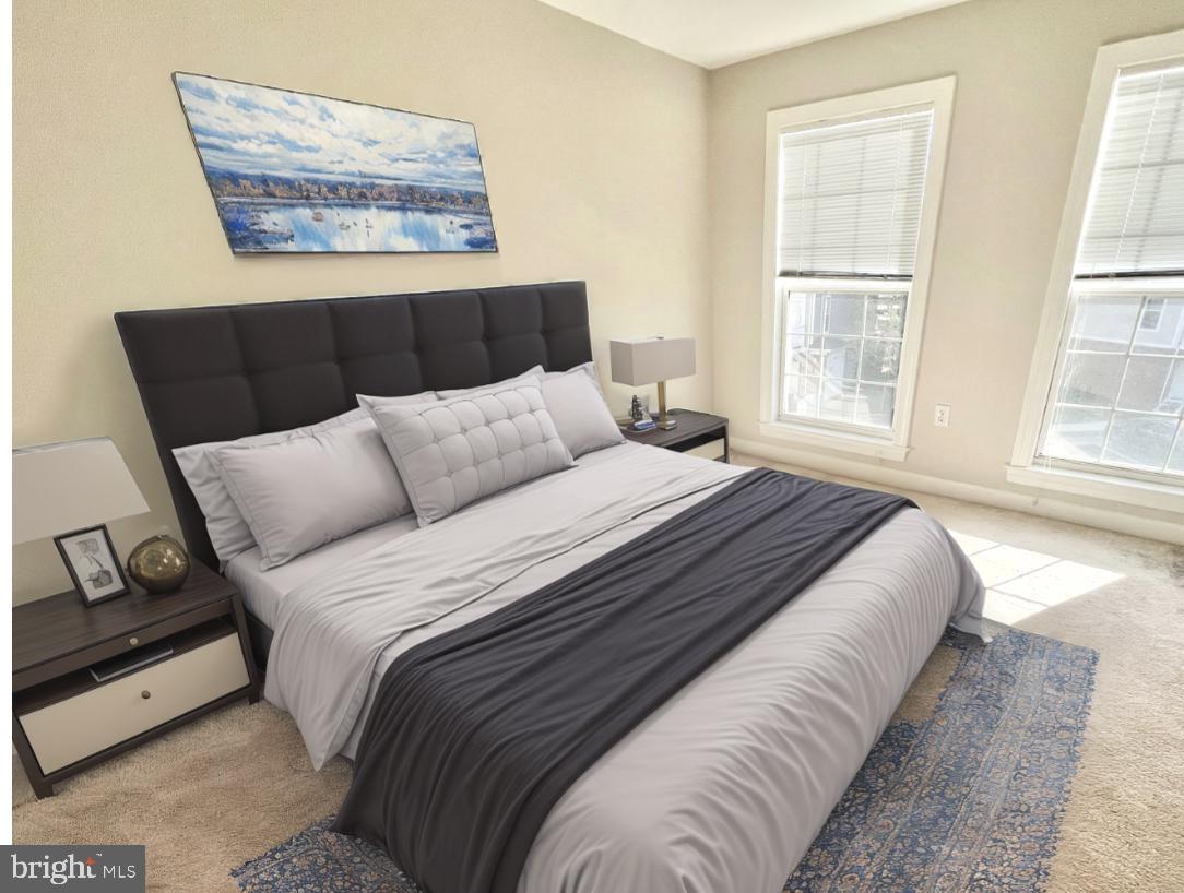 13548 Davinci Lane, Unit 46 Herndon, VA 20171 - Photo 21 of 28 a bedroom with a bed and wooden floor