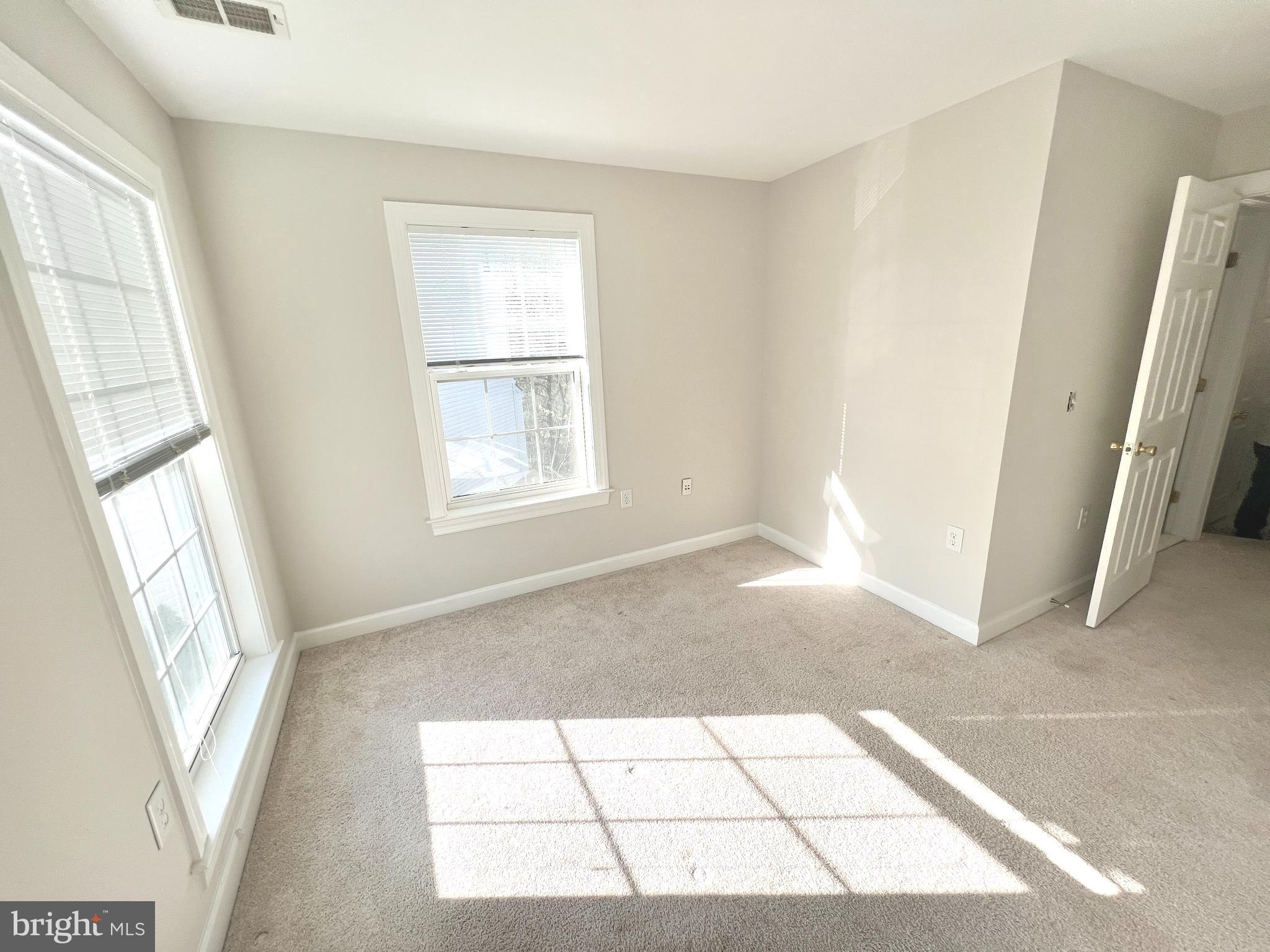 13548 Davinci Lane, Unit 46 Herndon, VA 20171 - Photo 24 of 28 a view of an empty room with a window