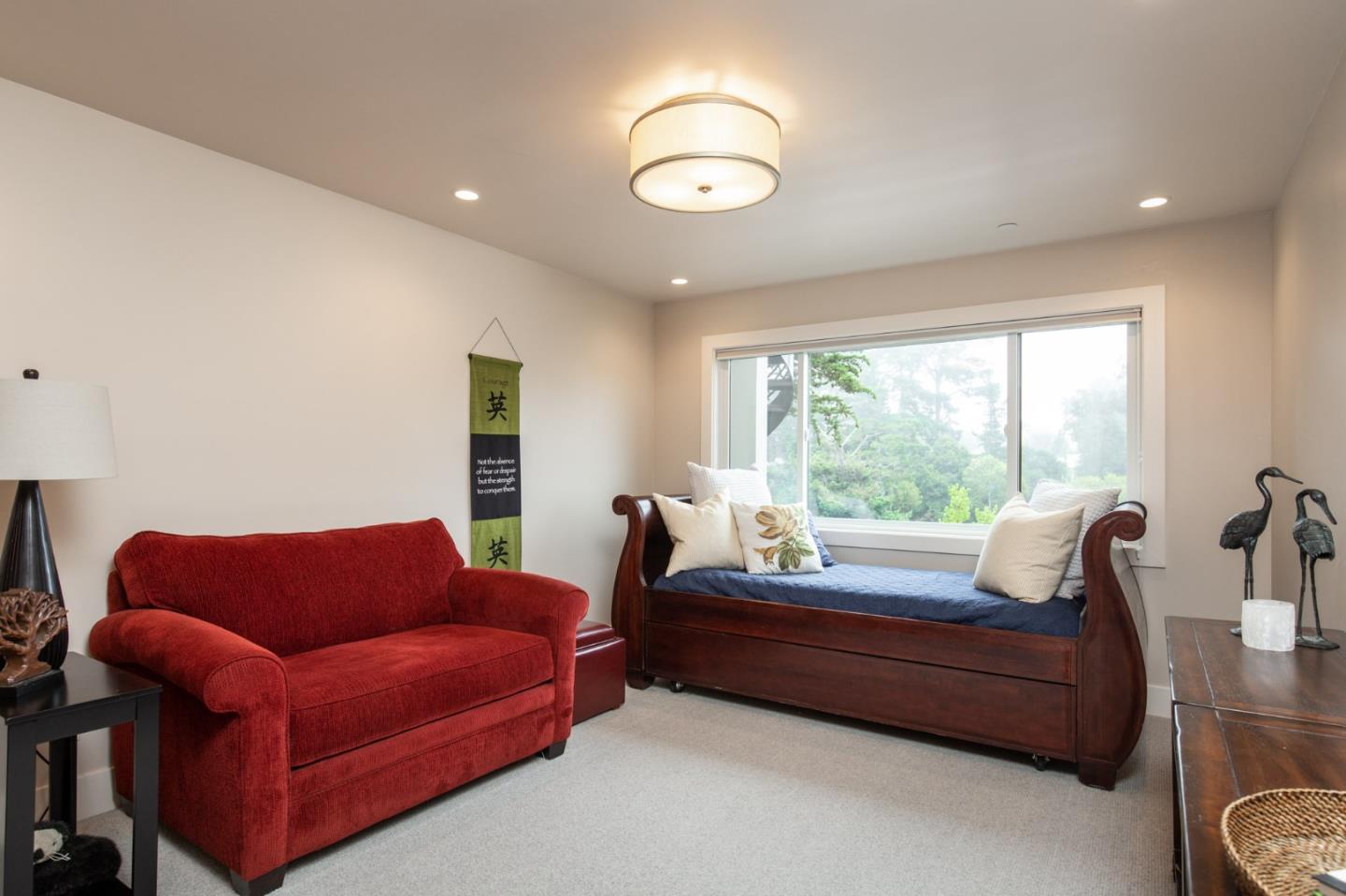 3292 Martin Road Carmel, CA 93923 - Photo 19 of 27 a bedroom with furniture and a window