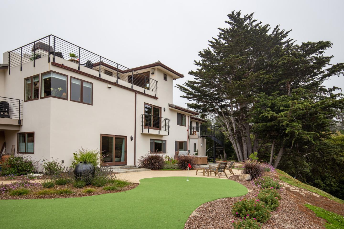 3292 Martin Road Carmel, CA 93923 - Photo 25 of 27 a front view of a house with a yard